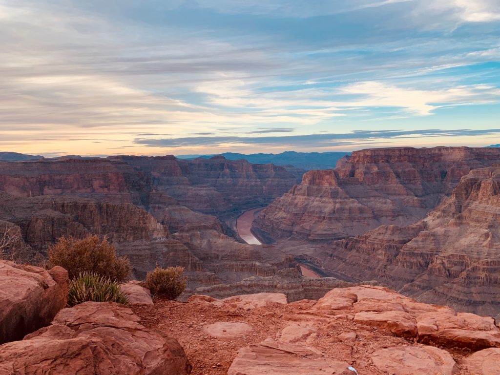 The walls of a deep canyon at sunset